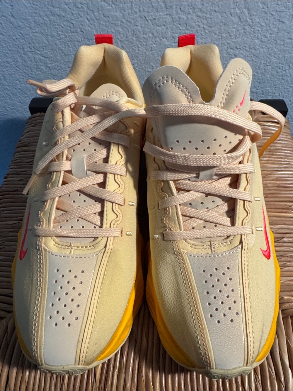 Nike Kids Pale Yellow Sneakers with Pink Swoosh